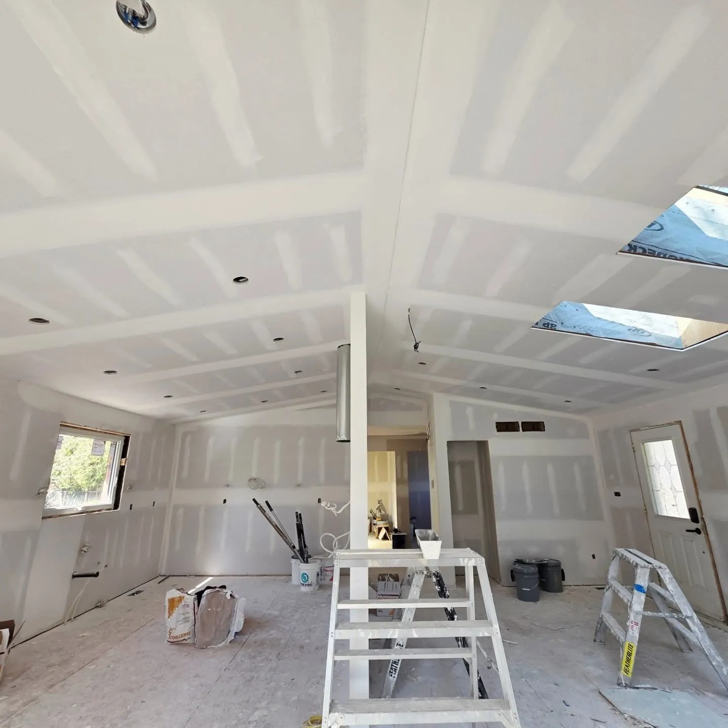 Drywall finishing on a cathedral ceiling in Dundas